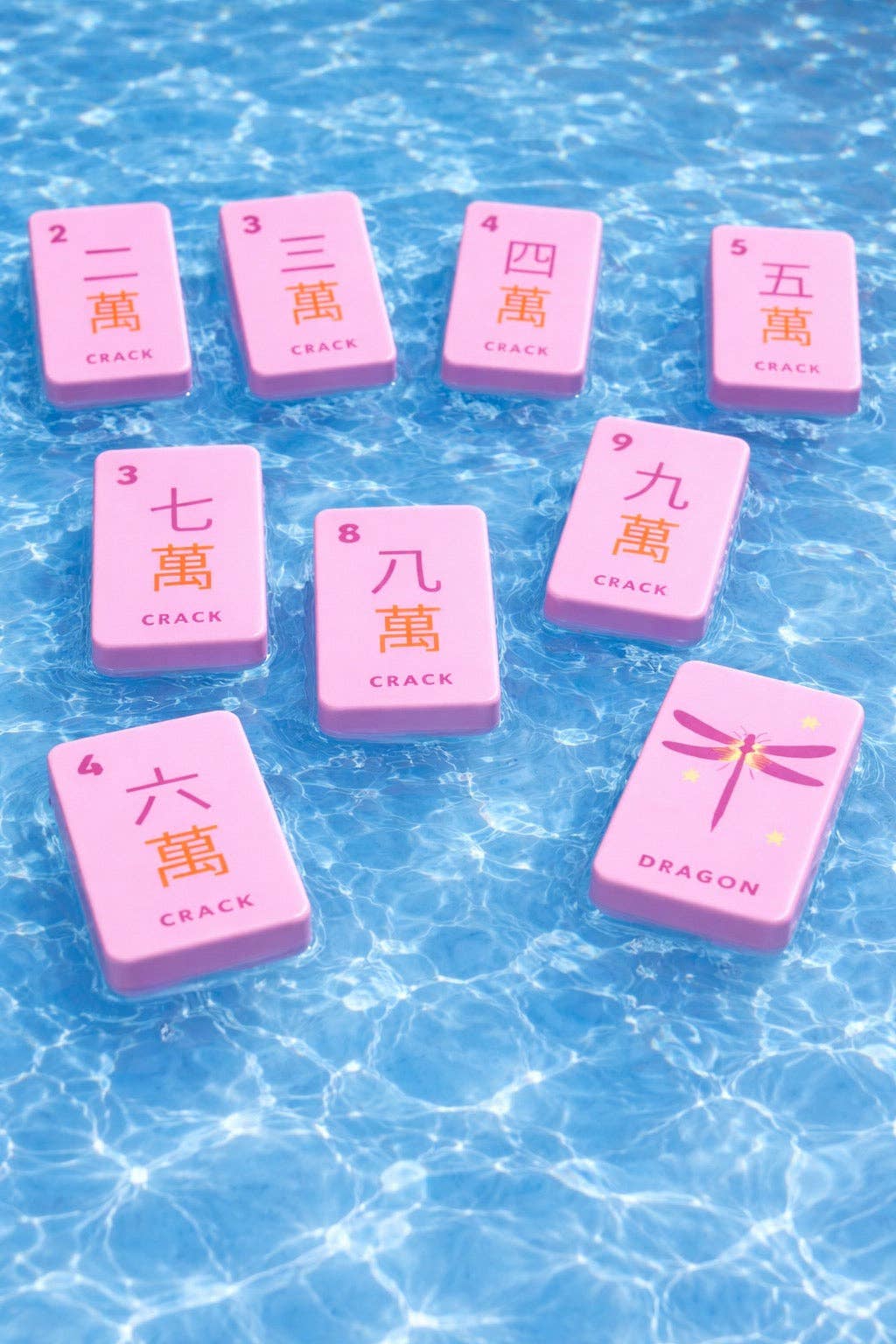 Floating Mahjong Tiles in Floral Pink for the Pool