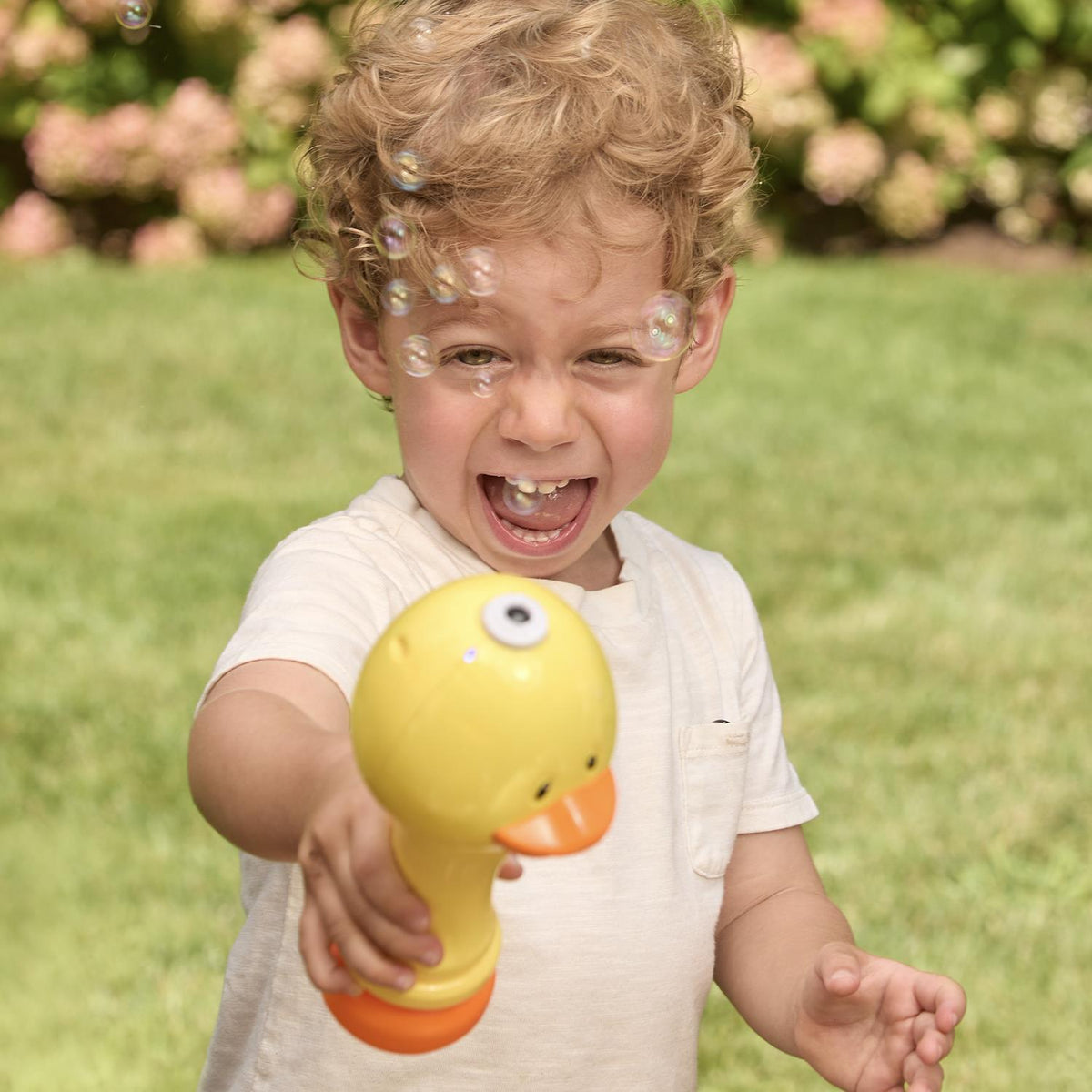 Spring Bubbles LED Illuminating Bubble Wand Blower with Refillable Bottle