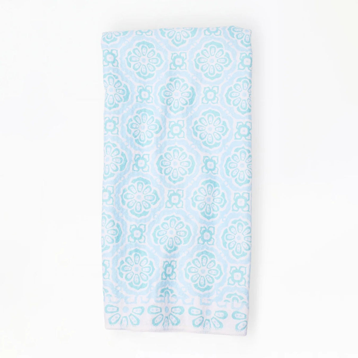 Light blue patterned towel on a white background