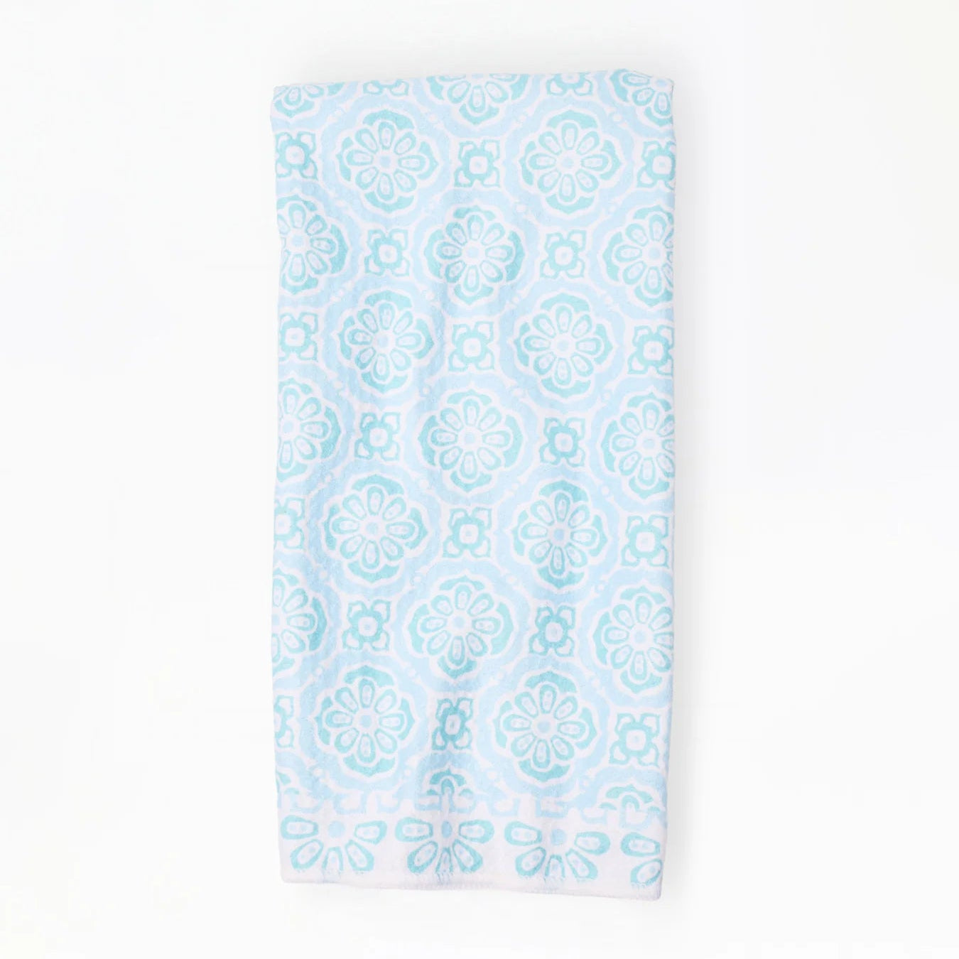 Light blue patterned towel on a white background