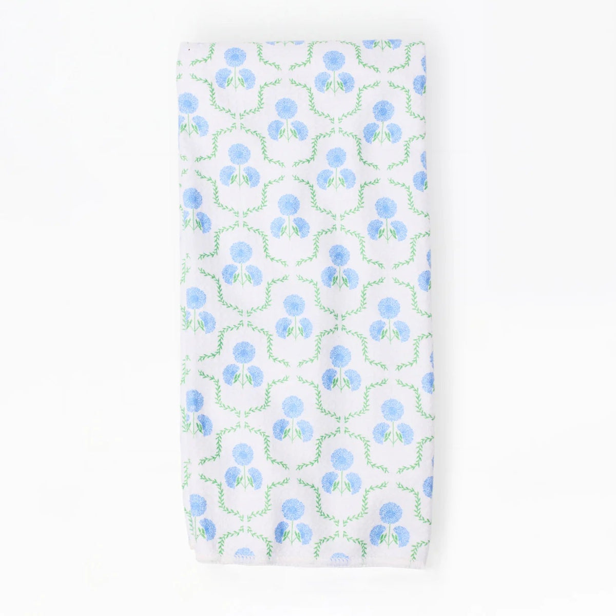 Patterned towel with blue and green design on a white background