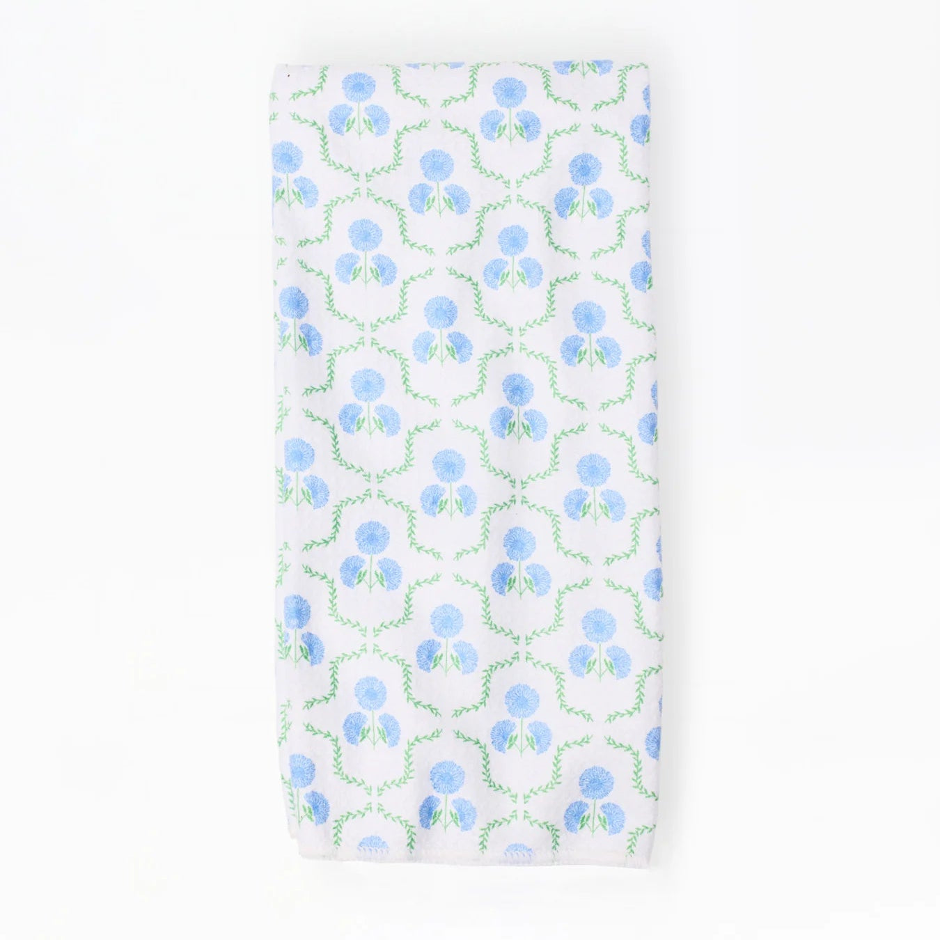Patterned towel with blue and green design on a white background