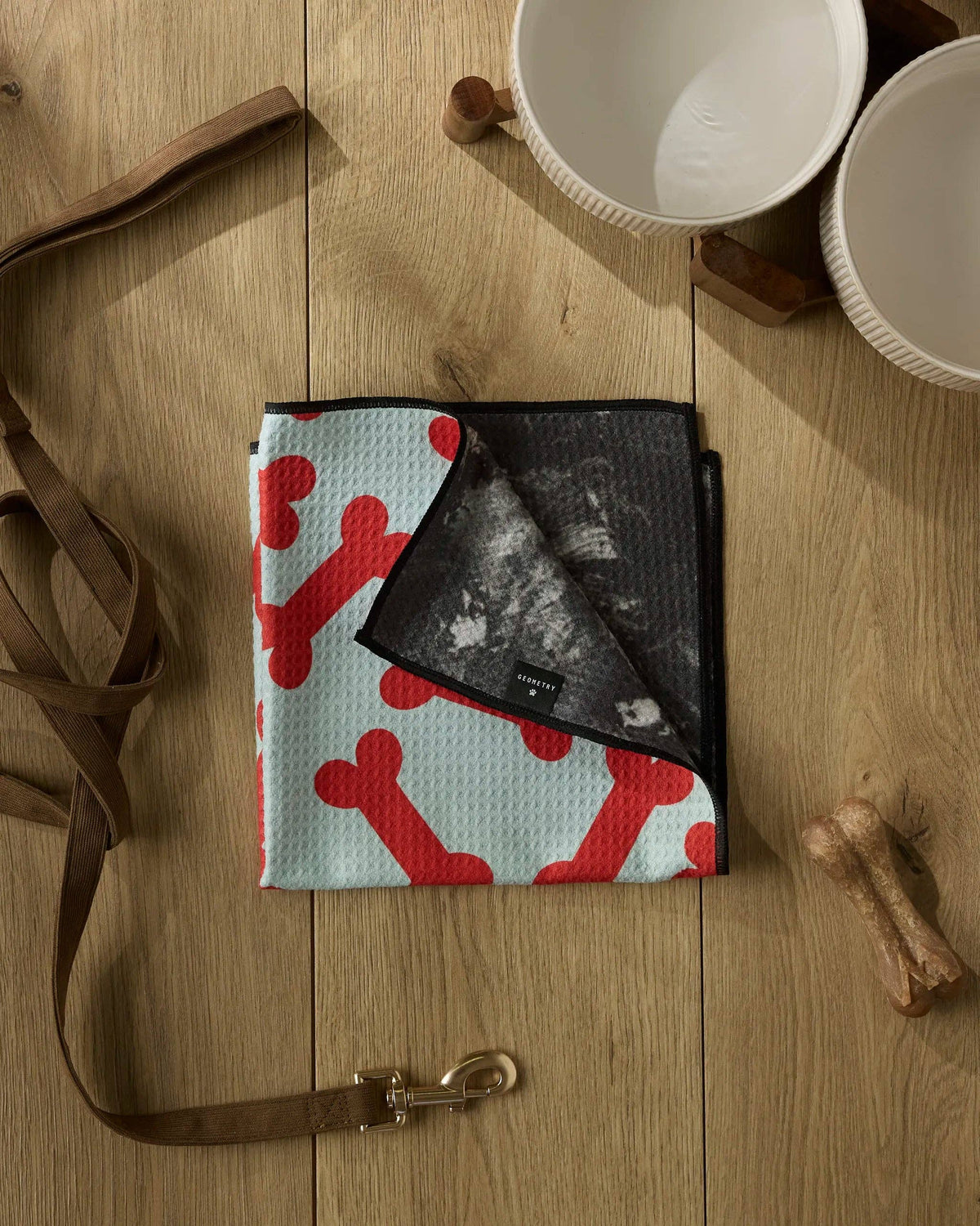 Yuletide Pup Paw Towel by Geometry