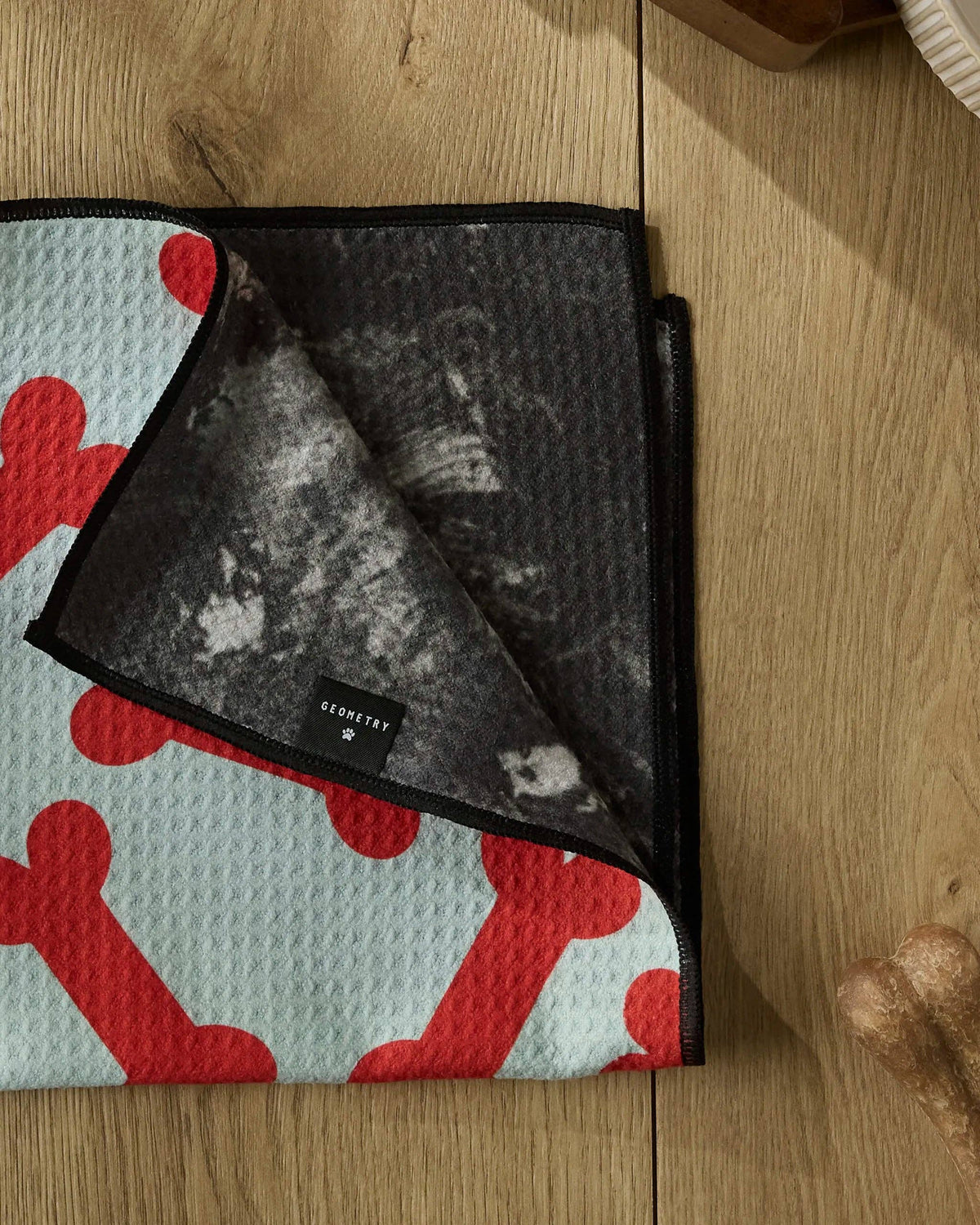 Yuletide Pup Paw Towel by Geometry